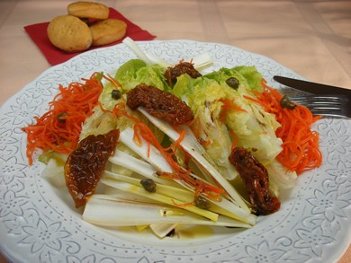 Entrada Ensalada de cogollos y tomates secos